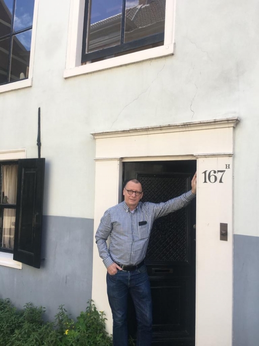 Bert Nap, seen in front of his residence, acknowledges the pros and cons of having fewer tourists in Amsterdam as a result of coronavirus restrictions.