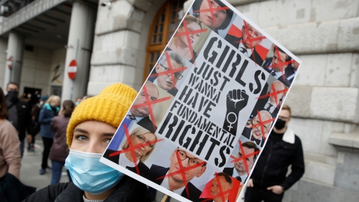 A woman takes part in the protest against the high court ruling, in Warsaw, Poland.