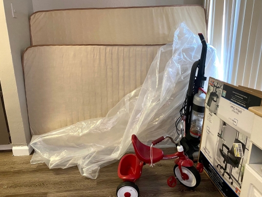 Donated mattress and a tricycle are among the items slowly arriving at a newly arrived Afghan family’s apartment in Sacramento, California. Donated mattress and a tricycle are among the items slowly arriving at a newly arrived Afghan family’s apartment in Sacramento, California.