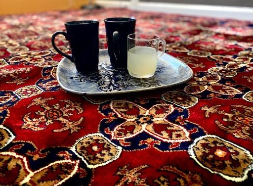 A newly arrived Afghan family, now in Sacramento, California, is slowly furnishing their apartment. A family friend, also from Afghanistan and now living in Sacramento, too, gave them a Persian rug. A newly arrived Afghan family, now in Sacramento, California, is slowly furnishing their apartment. A family friend, also from Afghanistan and now living in Sacramento, too, gave them a Persian rug.
