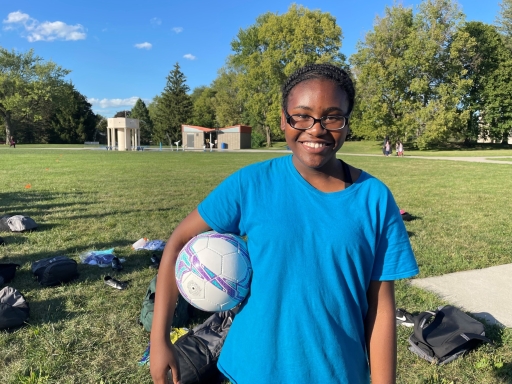 Nadege Lenge, 11, poses with her soccer ball Nadege Lenge, 11, poses with her soccer ball