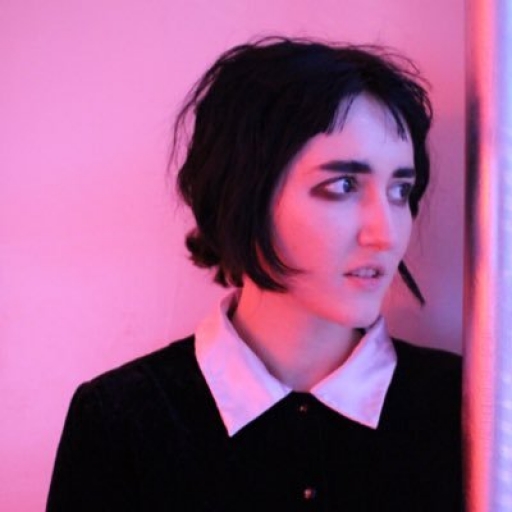Portrait of woman in pink light